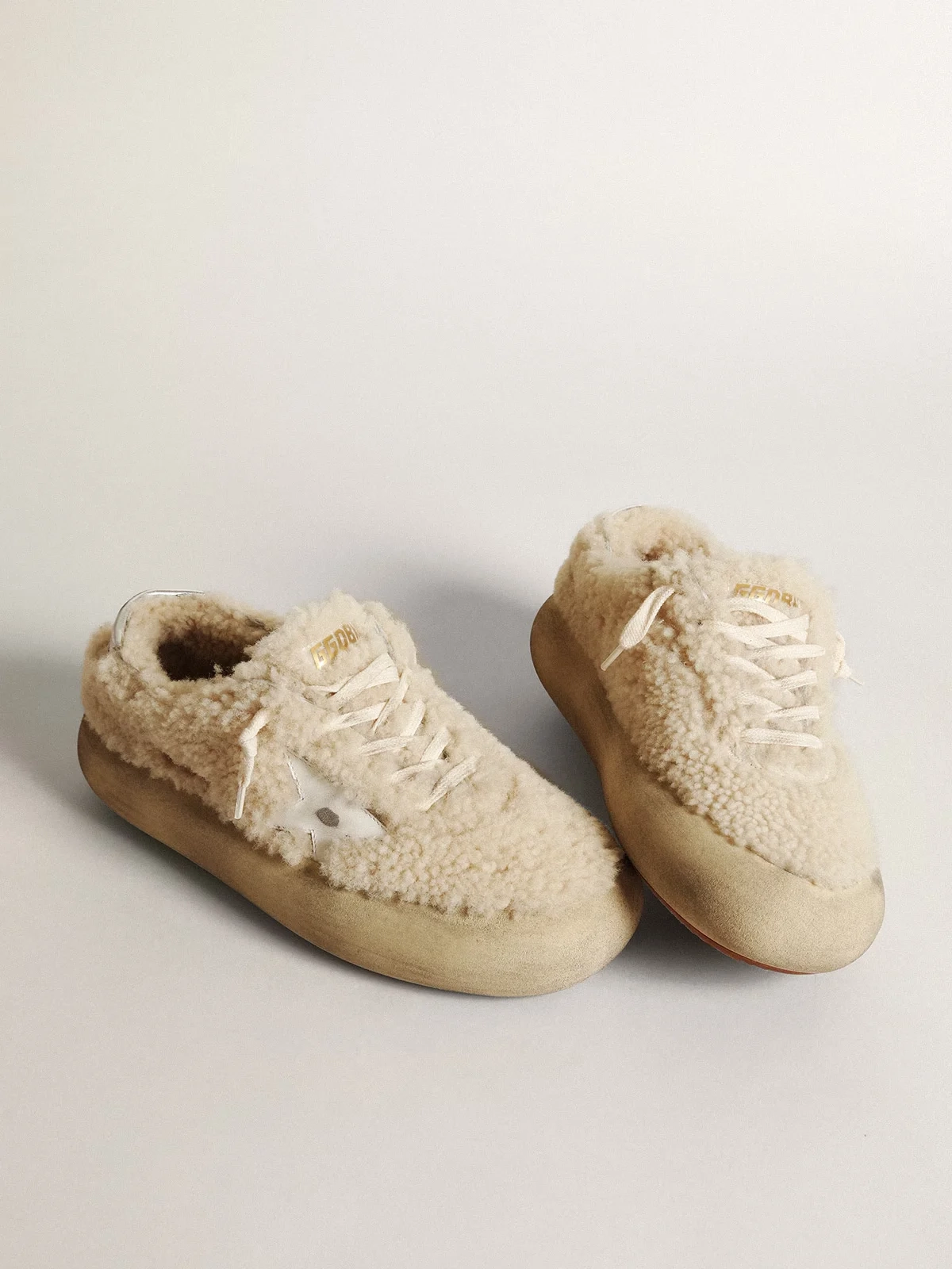 Womens Space Star shoes in beige shearling with white leather star and metallic leather heel tab